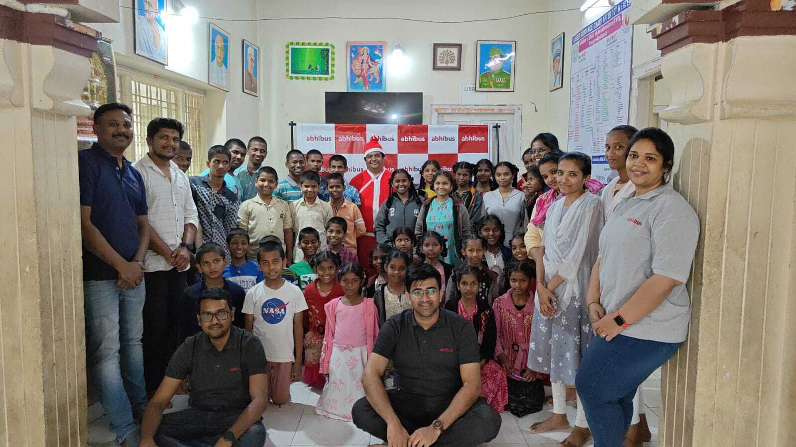 AbhiBus CSR team with children